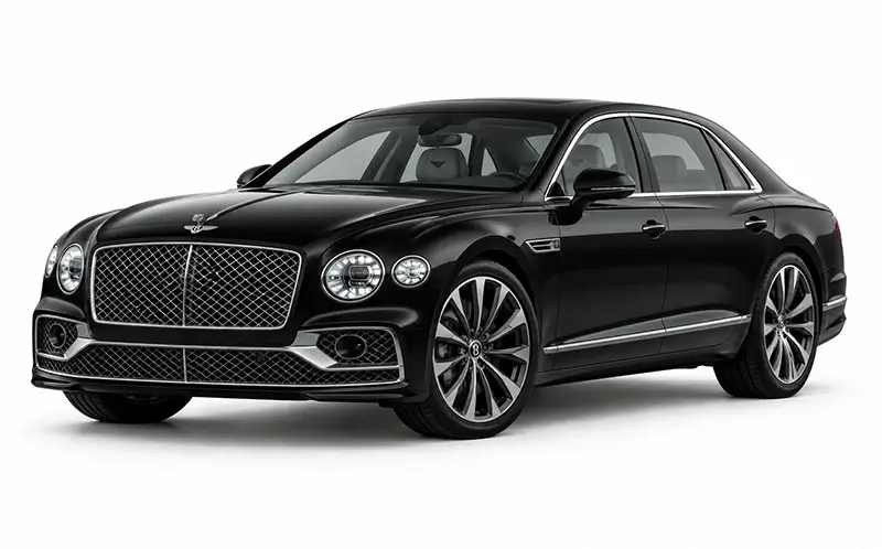 Hire a Bentley Flying Spur in India with a private chauffeur for VIP travel, luxury weddings, airport transfers, palace hotels and bespoke India tours.