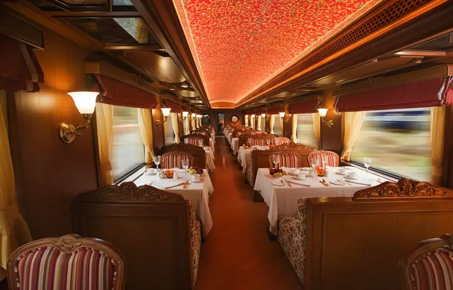 luxury train red dining car interior